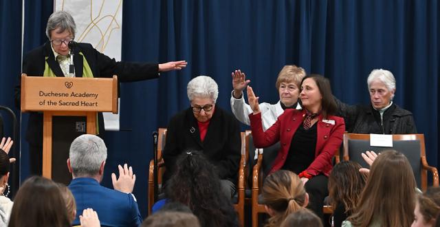 Sister Karam receives a blessing from the Duchesne community.